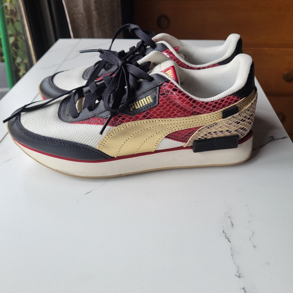 Puma Red and Gold Sneakers Sleek Retro Design